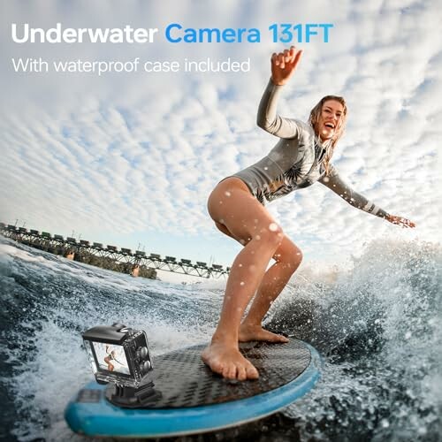 Person surfing on a wave with an underwater camera in the foreground.