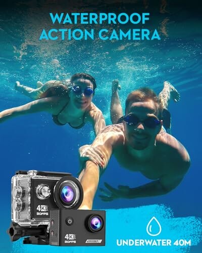 Two people swimming underwater with waterproof action camera.